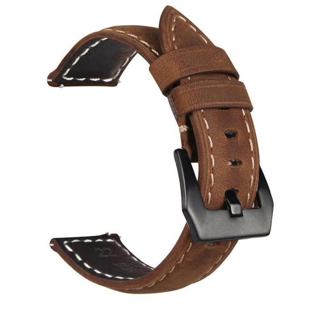 Brown leather watch strap with black buckle on a white background