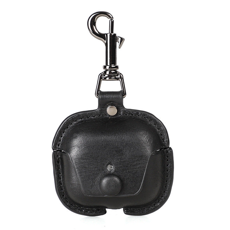 Black leather keychain case with a clip on a white background