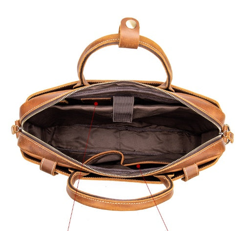 Brown leather briefcase with open lid on a white background