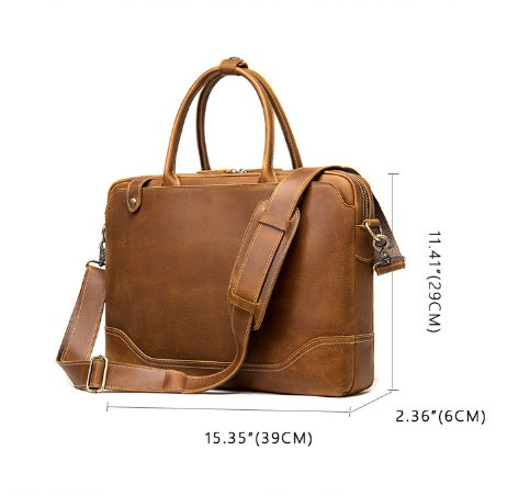 Brown leather briefcase with measurements on a white background