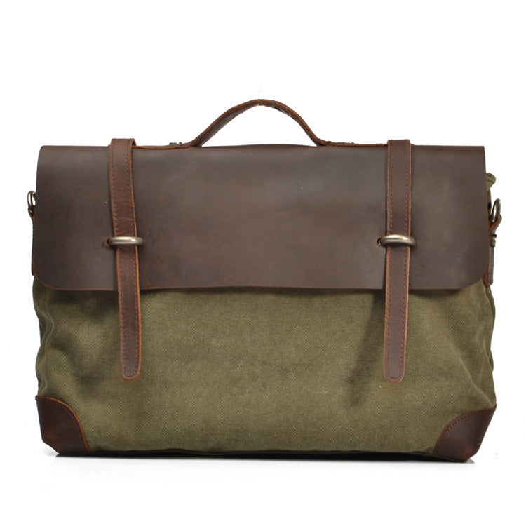 Green bag with brown leather accents on a white background