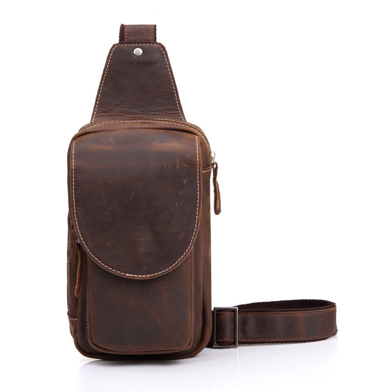 Brown leather sling bag on a white background