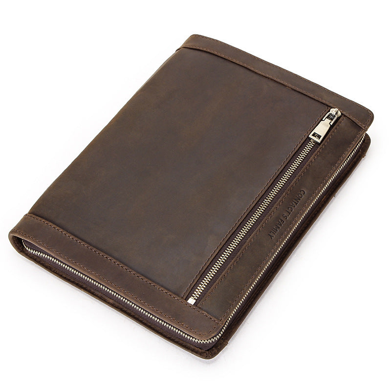 Brown leather zippered case on a white background