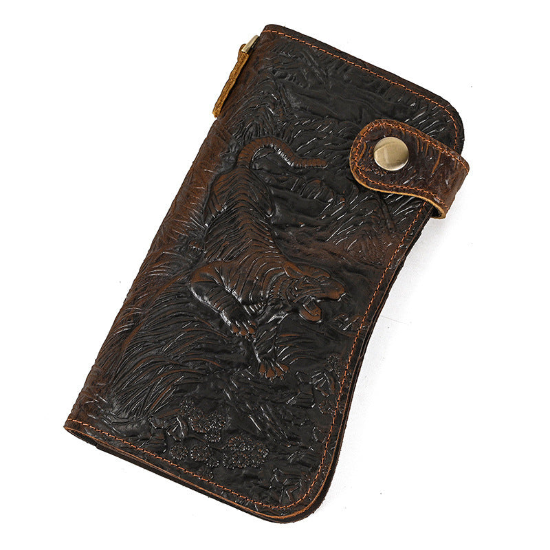 Brown leather wallet with embossed design on a white background