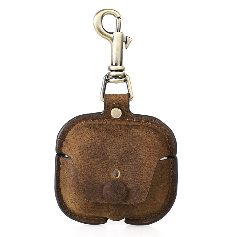 Brown leather keychain with a metal clasp on a white background