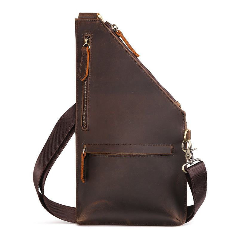 Brown leather sling bag on a white background