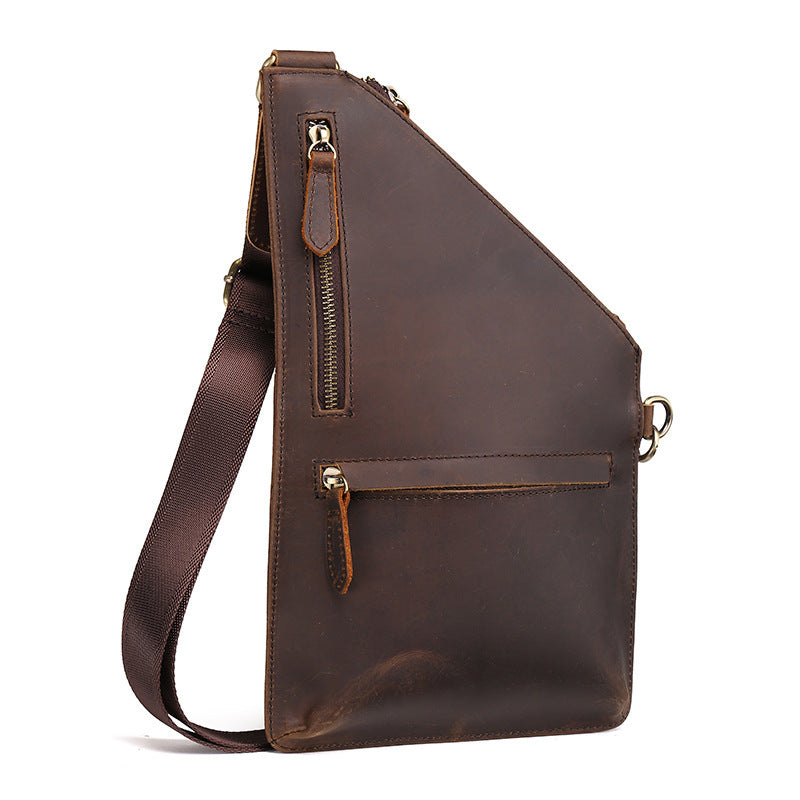 Brown leather sling bag on a white background