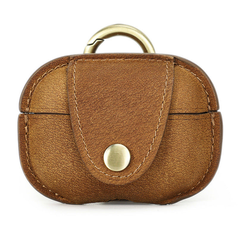 Brown leather keychain with gold accent on a white background