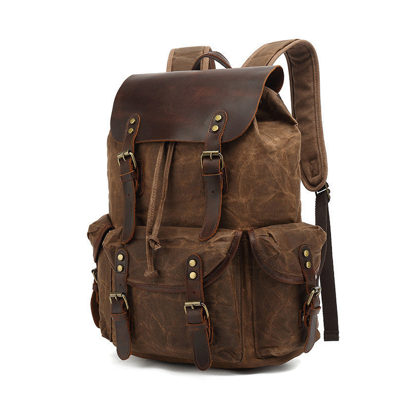 Brown leather backpack on a white background