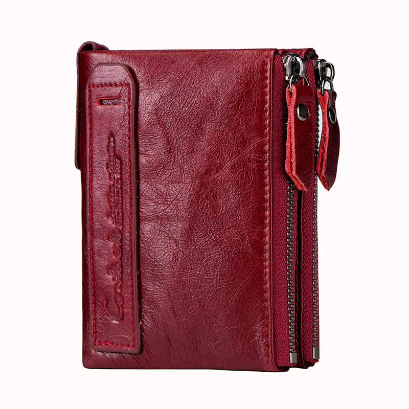 Red leather wallet with a zipper on a white background
