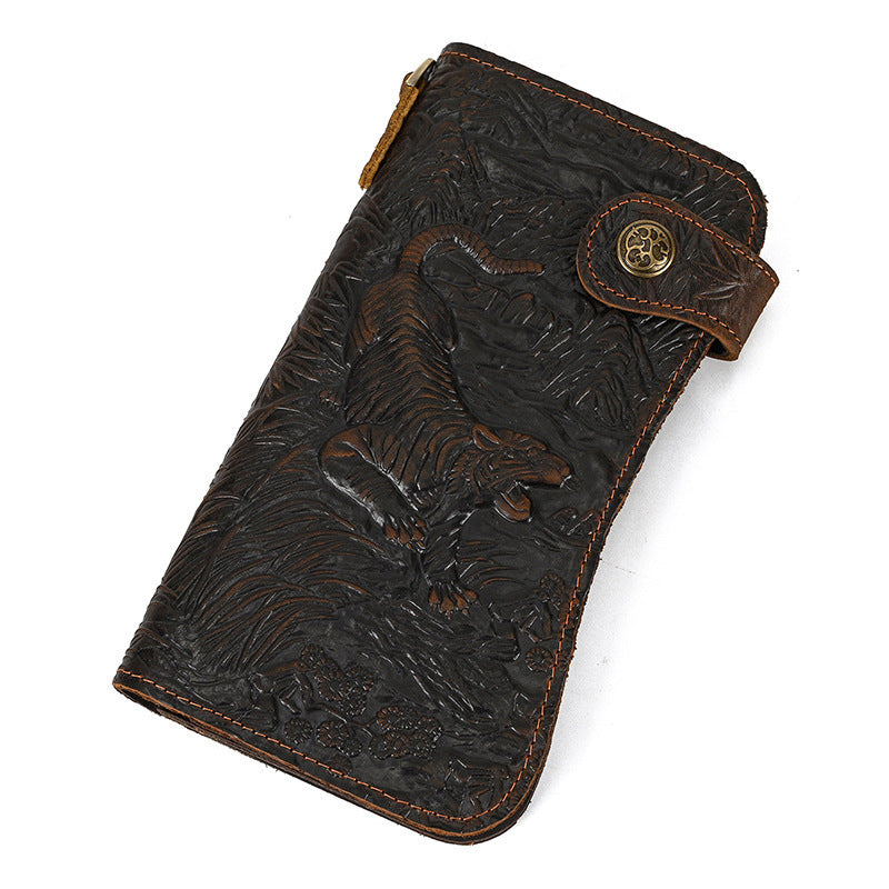 Brown leather wallet with tiger design on a white background