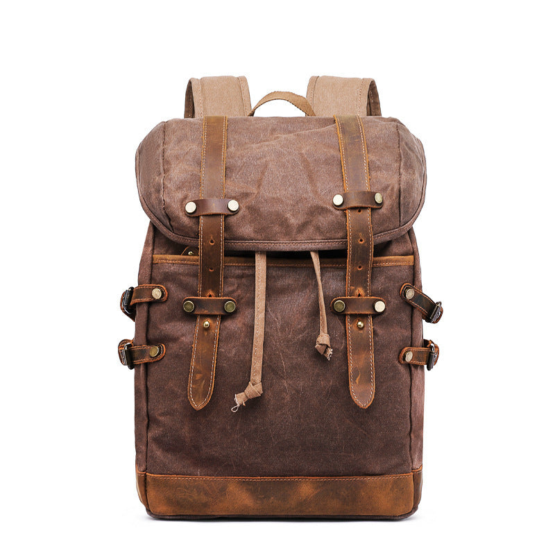 Brown leather backpack on a white background