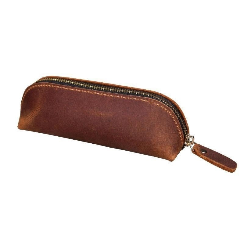 Brown leather pencil case with a zipper on a white background
