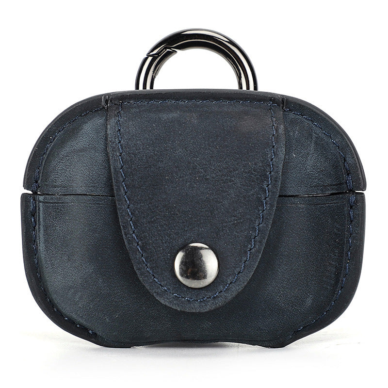 Blue leather keychain pouch with a silver button and ring on a white background
