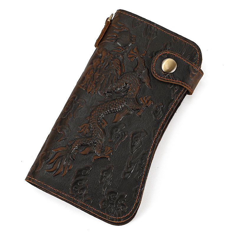 Brown leather wallet with embossed design on a white background