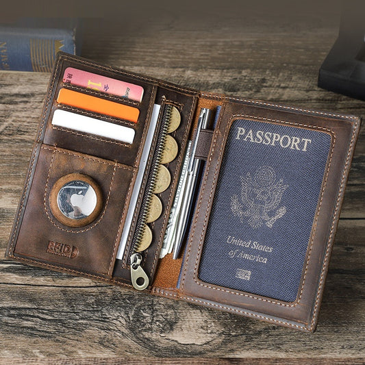 Brown leather wallet with various compartments on a wooden surface